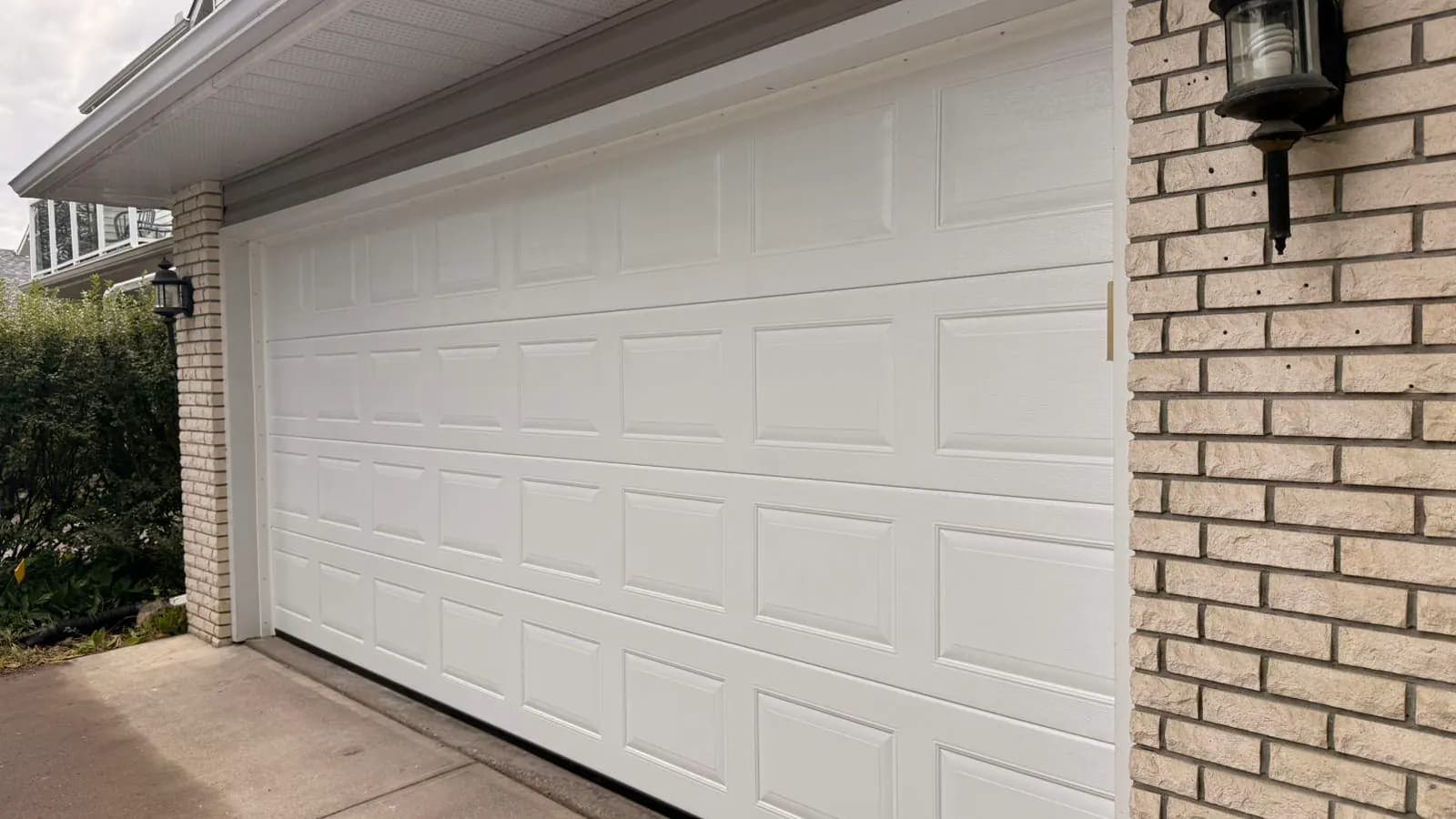 A Simple White Garage Door With Ryterna Hardware: Deer Run Calgary
